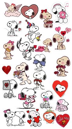 some stickers that are on the side of a white wall with hearts and dogs