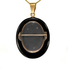 "Queen Victoria set the example for wearing mourning jewelry and it quickly became fashionable. This laboriously cut black onyx showcases antiqued gold initials with seventy-two rose-cut diamonds. On the back, you will see an encapsulated pocket to store photos, or more traditionally, a locket of hair. Perfect for a layering option, we have added an extinct, fossilized Trilobite pendant. Trilobite 1.20 x 0.65\" Trilobite is in gold-plated setting Brooch 2.75 x 1.50\" Brooch Depth 9mm 72 rose-cut Store Photos, Gold Initial, Queen Victoria, Rose Cut Diamond, Antique Victorian, Plate Sets, Rose Cut, Black Onyx, Antique Gold