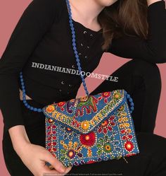 Indian Rajasthani Jaipuri Art Sling Bag Fold Over Clutch Purse With Multiple Colour For Women and Girl Party Wedding Carry. Handicrafts and Jewellery Designer Women Sling Bags, Evening Handbags for women Best for gifting, Diwali Gift, Wedding Favors, Indian Sling bags. SURPRISE GIFT: You may get a free surprise gift parcel from us. Pack of - Assorted Colors bags. * Material: polyester Embroidered fabric (Both Side Work) * Size : 23x18 Inches * Type: Casual, Ethnic, traditional, wedding, embroide Traditional Blue Bags For Festivals, Traditional Blue Shoulder Bag For Festivals, Handmade Blue Shoulder Bag For Festivals, Blue Rectangular Shoulder Bag For Festivals, Rectangular Bag With Mirror Work For Gift, Embroidered Rectangular Potli Bag, Traditional Blue Bags Suitable For Gifts, Rectangular Bags With Mirror Work For Gifts, Traditional Blue Embroidered Shoulder Bag