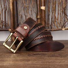 Enhance your style with the Raj leather belt for men. The braided central strap and roller buckle add a subtle elegance to your outfit. With a width of 3.8 cm, it provides a perfectly tailored look. Trust yourself and let this belt elevate your outfits. Classic Leather Rope Belt, Formal Leather Rope Belt, Brown Leather Rope Belt, Brown Belts And Suspenders With Antique Buckle For Business, Belts For Men, Buckle Jeans, Khaki Fashion, Subtle Elegance, Designer Belt