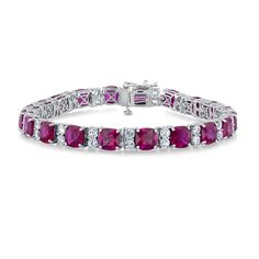 Brighten your jewelry collection with this created gemstone tennis bracelet. Perfect for everyday wear, this sterling silver bracelet features 20 created blue rubies and 40 created white sapphires in an elegant alternating pattern. It can be worn by itself or stacked with other bracelets that best express your individuality. The bracelet measures 7.25 inches in length and 6mm in width. Classic Ruby Gemstone Tennis Bracelet, Classic Ruby Tennis Bracelet For Anniversary, Ruby Gemstone Tennis Bracelet In Fine Jewelry Style, Classic Ruby Tennis Bracelet With Jubilee Design, Silver Tennis Bracelet, Wedding Day Jewelry, Engagement Ring Guide, Ring Size Guide, Sterling Silver Bracelet