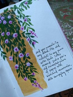 an open book with flowers on it and a poem written in cursive writing