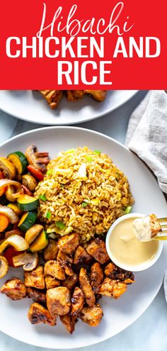 chicken and rice is served on a white plate with a small bowl of ranch dressing