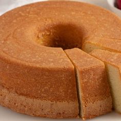 a bundt cake with slices cut out on a plate