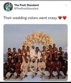 a group of men and women posing for a photo in front of a wedding arch