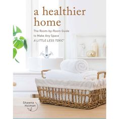 the cover of a book with an image of a basket and towels on top of it