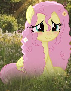 a pink pony sitting on top of a lush green field next to flowers and trees