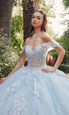 Long pastel tulle a-line quinceanera ball gown with off the shoulder straps and sequin details. Baby Blue Quinceanera Dresses, Baby Blue Quinceanera, Designer Prom Dress, Quinceanera Dresses Blue, Quince Dress, Formal Wear Dresses, Quinceanera Dress, Prom Designs, Designer Prom Dresses