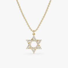 This meaningful necklace features a petite Star of David charm, crafted in lustrous 14k yellow gold. A sparkling diamond accents the center, adding a touch of brilliance and timeless symbolism. This necklace suspends from a dainty chain, making it a perfect way to showcase your faith for any occasion. - Handmade - Natural Diamonds  - G Color, SI Quality Diamonds - Solid Gold - Star Size: 12 mm - Total Diamond Carat Weight: 0.11 ctw 🛠 Your Sarah Elise piece is handcrafted with care! Ready-to-shi Gold Diamond Necklace With Star Of David For Gift, Diamond Necklace With Star Of David Charm For Gift, Gift Diamond Necklace With Star Of David Accents, Memory Ring, Diamond Charm Necklace, Star Of David Necklace, Meaningful Necklace, Chain Making, Solid Gold Necklace