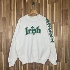 Vintage 90s University of Notre Dame Sweatshirt Jumper Notre Dame Crewneck Spell Outs Notre Dame Pullover Sweater Large Size White *50% Polyester *50% cotton *tag Fotl *Made in USA *Tag reads:   Size :  Large (check measurements below) *Manual size measurement  Width : 23.5" inches (armpit to armpit)                           Length : 28" inches  All measurements are taken with the garment flat on the ground. *Condition: have yellow stain (washable) very good condition check picture refer pictur 90s Long Sleeve Sweater With Letter Print, Vintage Sweater With Letter Print And Long Sleeves, Vintage Long Sleeve Sweater With Letter Print, Retro White Sweater With Letter Print, White Retro Sweater With Letter Print, Vintage White Sweater For College, White Vintage Sweater For College, Retro White Crew Neck Sweater, 90s Style White Crew Neck Sweater