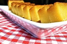 there are many pieces of bread on the plate in the tableclothed dish, ready to be eaten