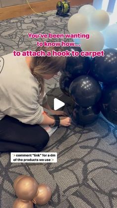 a woman sitting on the floor with balloons in front of her and an ad about how to attach hooks to carpet