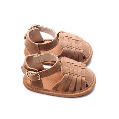 ***Looking for a larger size? Click HERE to see this same style with larger sizes in a hard sole.*** Introduce your little one to stylish comfort with our Camel Woven Sandals, available in US sizes 2-4. These adorable sandals are perfect for early walkers, combining a charming woven design with a soft sole for maximum comfort and flexibility. Crafted from genuine leather, they offer a delightful blend of style, quality, and ease of wear. Key Features: Adorable Design: The intricate woven pattern Brown Flat Heel Non-slip Sandals, Synthetic Open Toe Sandals With Soft Sole, Non-slip Synthetic Round Toe Sandals, Open Toe Synthetic Sandals With Soft Sole, Non-slip Synthetic Sandals With Round Toe, Spring Slip-on Sandals With Soft Sole, Brown Non-slip Round Toe Sandals, Brown Closed Toe Non-slip Sandals, Round Toe Sandals With Rubber Sole