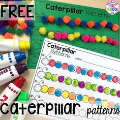 colorful caterpillar patterns and crayon markers on a table