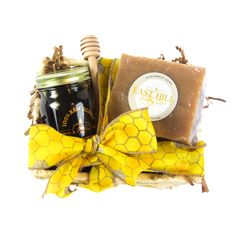 a gift basket with honey, soap and beeswatche for someone's special occasion