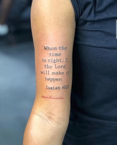 a person with a tattoo on their arm that says, when the time is right, i the lord will make it happen