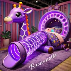 an inflatable giraffe bed with lights on it