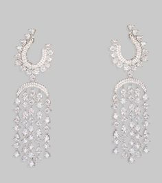 White Finish Diamond Chandelier Earrings Zevar By Geeta - Fabilicious Fashion Drop Bridal Earrings For Party, Glamorous Festive Dangle Bridal Earrings, Festive Glamorous Dangle Bridal Earrings, Crystal Drop Bridal Earrings For Party, Glamorous Long Drop Chandelier Earrings For Evening, Party Crystal Drop Bridal Earrings, Party Bridal Drop Earrings With Crystals, Party Long Drop Chandelier Earrings With Cubic Zirconia, Elegant Teardrop Chandelier Earrings For Party