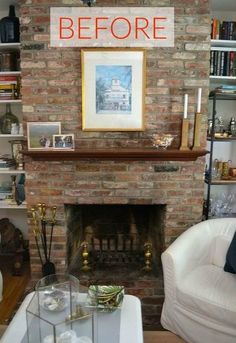 a living room filled with furniture and a fire place in front of a brick fireplace