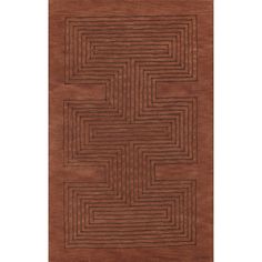 a brown rug with an intricate design on the front and back side, in two different colors