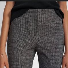 Sleek And Streamlined, Our Mid-Rise Skinny Legging Features An Elastic Waist, Split-Needle Seams In The Back, And An Understated Split Hem. It’s Crafted With A Wrinkle And Abrasion-Resistant Knit That’s Durable, Quick-Drying, And Detailed With A Houndstooth Pattern. Style #: L1027202 * True To Size, Choose Your Normal Size * High Rise, Skinny Leg * Full Length * Model Is 5’11” And Wearing A Us Size S Composition * Shell: 73% Polyamide * 27% Elastane; Back: 73% Polyamide * 27% Elastane Care Do No Classic Houndstooth Pattern Bottoms, Stretch Houndstooth Pants For Work, Elegant Fitted Pants With Houndstooth Pattern, Elegant Fitted Houndstooth Pants, Elegant Black Houndstooth Bottoms, Fitted Houndstooth Bottoms For Workwear, Fitted Bottoms With Houndstooth Pattern, Chic Fitted Houndstooth Pattern Bottoms, Elegant Fitted Bottoms With Houndstooth Pattern