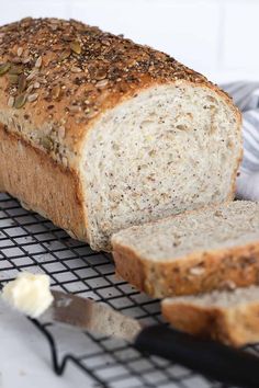 a loaf of bread sitting on top of a cooling rack