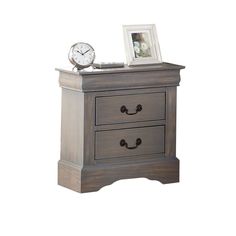 a nightstand with two drawers and a clock on top