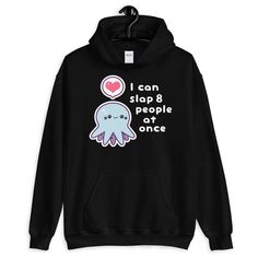 A soft kawaii hoodie with a super smiling octopus who's ready to slap 8 people...at once. This hooded sweatshirt looks great on both men and women. Perfect for people who love being sassy and looking cute. Runs large for women, order your regular size for an oversized look, order a size down for a more fitted look. Fits men true to size. Lined hood Double stitched throughout Soft Has a pocket Runs large for women Reduced pilling Plus sizes available Original artwork not available in stores Sizin Funny Octopus, Aesthetic Hoodies, Kawaii Hoodie, Kawaii Shirts, Dress Painting, Creepy Tattoos, Kawaii Christmas, Stylish Hoodies, Clothes Cute