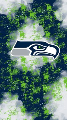 an image of the seattle football team logo in green and blue paint with white clouds behind it