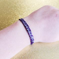 Show your ace pride with this handmade friendship bracelet! Made with high-quality 100% cotton thread in purple, gray, white and black - the colors of the asexual and demisexual flags - this bracelet is adjustable from about 11" (28cm) down to 5.5" (14 cm). The thread is colorfast so you're able to keep wearing it all day every day if you like! Bracelet comes tied in a loop with adjustable sliding knots. Slide both knots closer together to tighten the bracelet, or farther apart to make it bigger. Bracelets are handmade to order and length and appearance may very slightly. Need a bunch for a party, gifts, or as a fundraiser? Send us a message to inquire about our wholesale prices! Casual Purple Hypoallergenic Bracelets, Hypoallergenic Purple Friendship Bracelets, Casual Purple Braided Bracelet As Gift, Ace Pride, Asexual Pride, Handmade Friendship Bracelets, Sliding Knot, Lgbtq Pride, Purple Grey