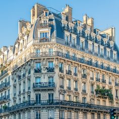 an old building with balconies and windows on the top floor in paris, france