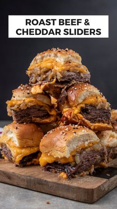 several cheeseburgers stacked on top of each other with the words roast beef and cheddar sliders above them