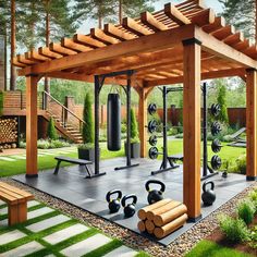 an outdoor gym with benches and exercise equipment