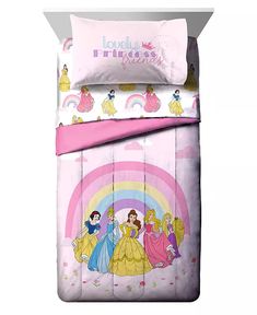 disney princess bedding set with pink sheets and pillowcases on top of it