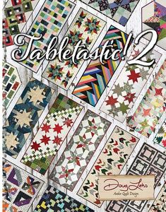 a book cover with many different quilts on it