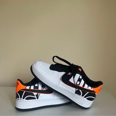 Grab These New And Rare Nike Air Force 1s With A Black/White/Orange Accent. These Have Been Discontinued And Unavailable Otherwise - Grab This Cool Look And Stand Out While You Can! Orange Custom Sneakers With Contrast Sole, Sporty Orange Custom Sneakers With Contrast Sole, Sporty Custom Orange Sneakers With Contrast Sole, Orange Basketball Shoes With Contrast Sole For Streetwear, Casual Orange Nike Air Force 1, Urban Orange Custom Sneakers For Sports, Urban Style Orange Custom Sneakers For Sports, Nike Air Force 1 Orange For Streetwear, Orange Low-top Nike Air Force 1