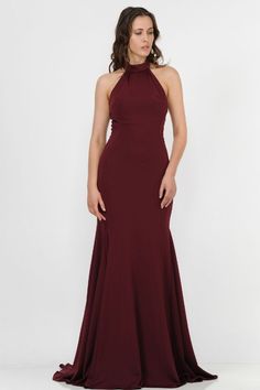 Make an impact in this long high-neck halter dress with mermaid train by Poly USA 8252. This beautiful formal gown features a high neck halter bodice, flirty open back, floor length mermaid skirt with sweep train, and a zipper closure. Affordably priced at $189, this long evening dress is perfect for any formal event and will keep you on budget! Designer: Poly USA Style Number: 8252 Material: Jersey, Polyester Details: Bra Cup, Fully Lined Fit: The model is 5'9" Length: Dress 64", Hollow to Hem 63" Colors: Black, Burgundy, Royal Blue, Rose Gold This item ships within 1 to 2 business days.