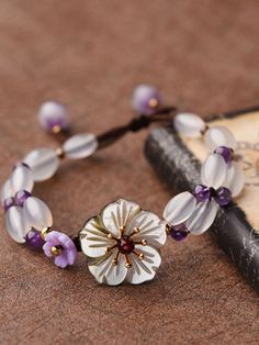 #shell #flowers #bracelet #amethyst Chinese Bracelet, Infinity Charm Bracelet, Shell Flowers, Gelang Manik-manik, Infinity Charm, Gelang Manik, Purple Crystal, Bracelet Online, Jade Bracelet