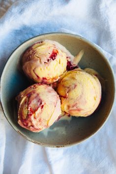 three scoops of ice cream in a bowl