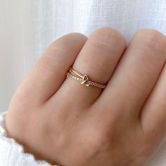 This eye-catching ring features a pavé band hugged by a knot. The knot ring is timeless and meaningful. Symbolizing love and friendship, this reminder ring makes a beautiful gift. MATERIALS: Cubic zirconia / 14k Gold/ Rose Gold / Rhodium Plated, Brass Follow us on INSTAGRAM @statementgrey Simple Ring Design, Diamond Knot Ring, Meaningful Rings, Gold Finger Rings, Diamond Knot, Love Knot Ring