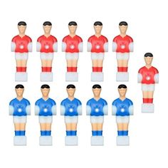 a group of plastic figurines of soccer players in red, white and blue uniforms