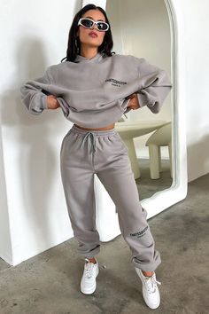 Living boujee and lounging in style! The Series 6 Sweatpants offer a soft fleeced inside, elasticated waistband with tie up drawstrings, a 'THATSSOFETCH' logo at the knee and cuffed ankles. Pair with the matching hoodie, sneakers and sunnies for a casual Sunday vibe. FABRICATION: 65% Cotton 35% Polyester SIZING: Crystal's height is 162cm and wears a size AU6/US2 Suit Series, Crop Outerwear, Suits Series, Orange Swimwear, Black Runners, Green Swimwear, Summer Formal Dresses, Lounge Sweater, Red Swimwear