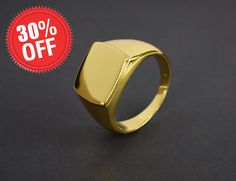 "This listing is for 18k Gold Filled signet ring the base metal is 925 sterling silver. this is a timeless classic that goes with just about any look and will look great both on man and woman. What is Gold Fill? It's an actual layer of gold-pressure bonded to another metal. Gold filled is not to be confused with gold plating as filled literally has 100% more gold than gold plating. Gold filled is much more valuable and tarnish resistant. It does not flake off, rub off or turn colors. As a matter of fact, anyone who can wear gold can wear gold filled without worries of any allergic reaction to the jewelry. Gold filled jewelry is an economical alternative to solid gold. Detail :- Material :- 18k Gold Filled Over 925 Sterling Silver.  Top Width: 12 mm. Bottom Width Band :- 3 mm. Weight :- 5.9 Modern Tarnish Resistant Signet Ring Gift, Shiny Finish Signet Ring As Gift, Gift Signet Ring With Shiny Finish, Gold Rings With Shiny Finish For Gift, Classic Signet Ring As Gift With Shiny Finish, Flat Ring, Ring Everyday, Everyday Ring, Everyday Rings