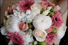 a bridal bouquet with pink and white flowers