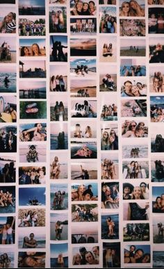 a wall covered in pictures of people posing for the camera, and one person taking a selfie