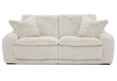 a white couch with two pillows on it