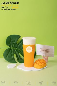 a cup and some food on a plate next to a green leafy plant with the words eatmark written below it