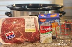 meat, spices and seasonings are on the counter next to an electric pressure cooker