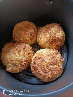 four fried meat patties in a slow cooker