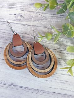 the wooden earrings are made from wood and have hearts on them